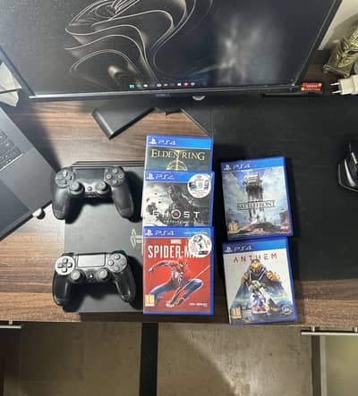 PS4 Pro with 2 controllers and 5 games