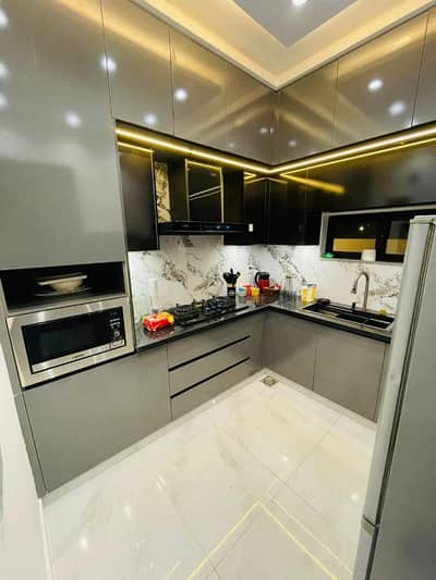 Contemporary House for Sale in DHA Phase 9 Town 3 Bedrooms, Double Kitchen & Servant Quarte