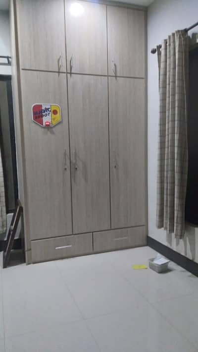 three door cupboard made by partex sheet