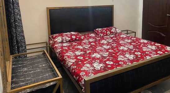 bed set with side tables and dressing table