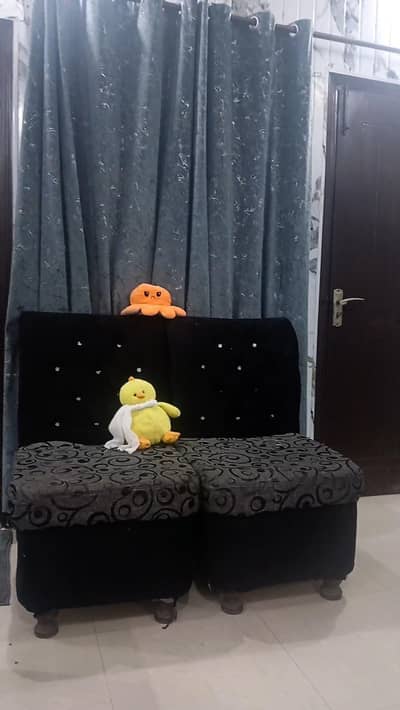 two 1 seater  sofas