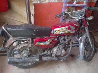 Honda 125 golden number 77