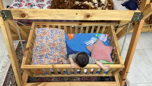 Baby swing cot