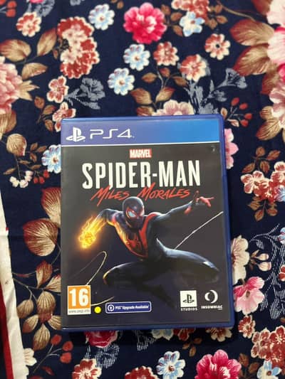 PS4 games Spiderman miles morals and Injustice 2