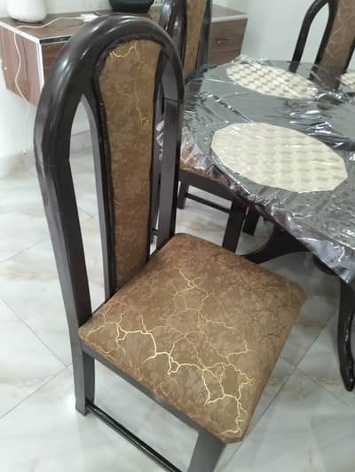 Round dining table with chairs.