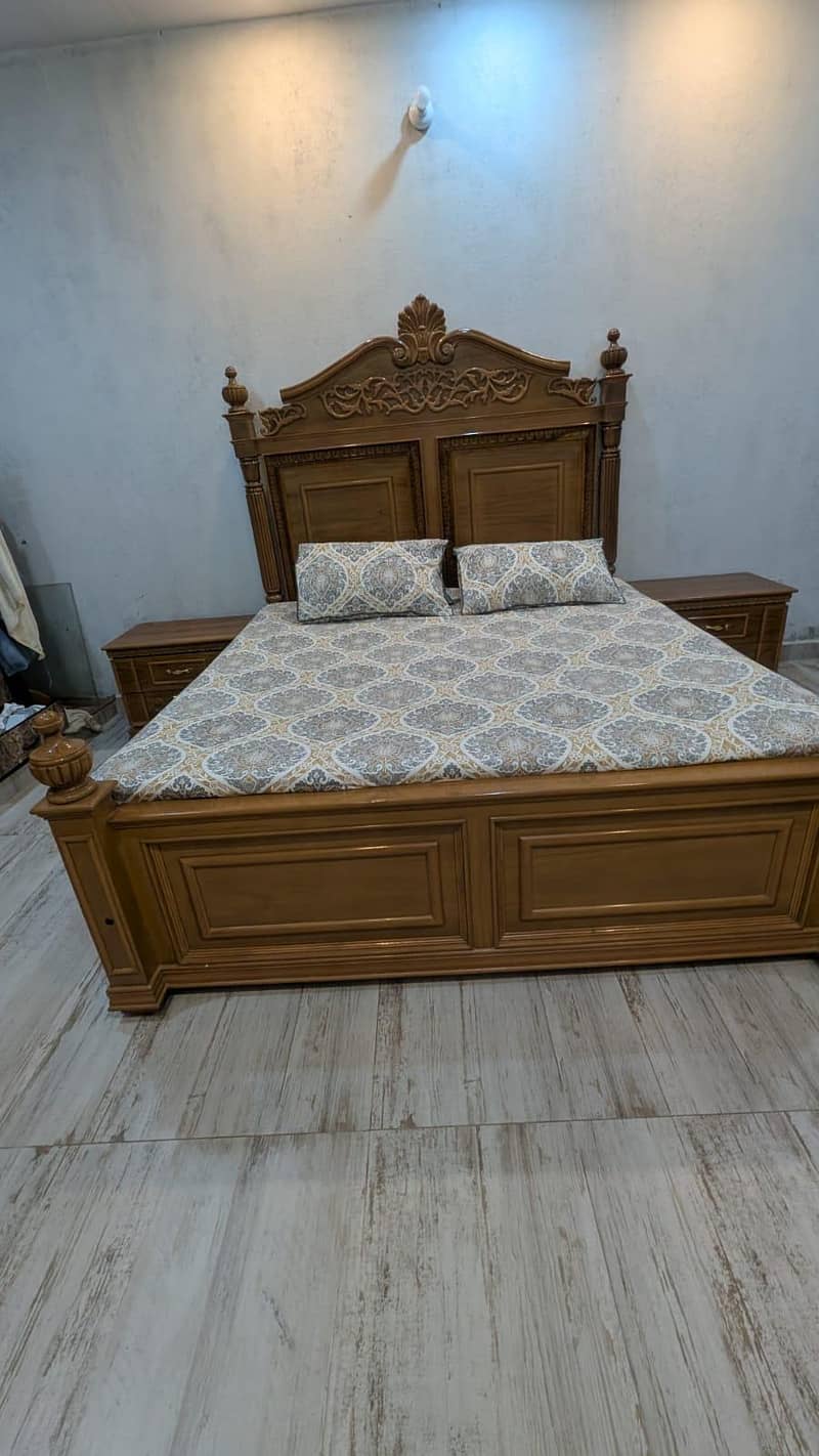 bed with side table and dressing 0