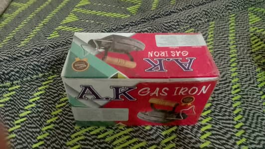 Gas Iron . The iron is in good condition .