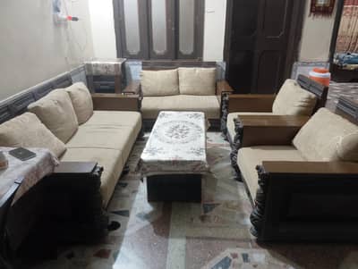 7 seater sofa set with 2 side tables and a table