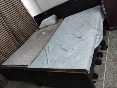 wooden two single beds