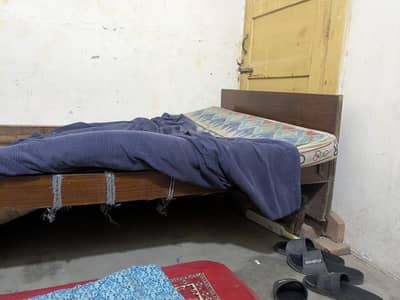 Single wood bed, wood chairs, side tables, office table