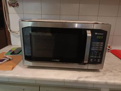 perfect working big microwave dowlance