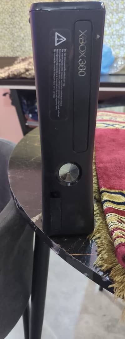 X box 360 console with 2 controllers x box slim