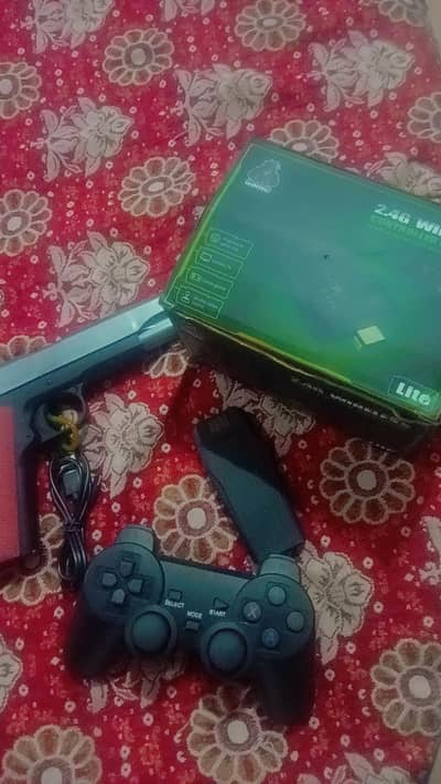 2 wireless Gaming Controllers + Gamestick