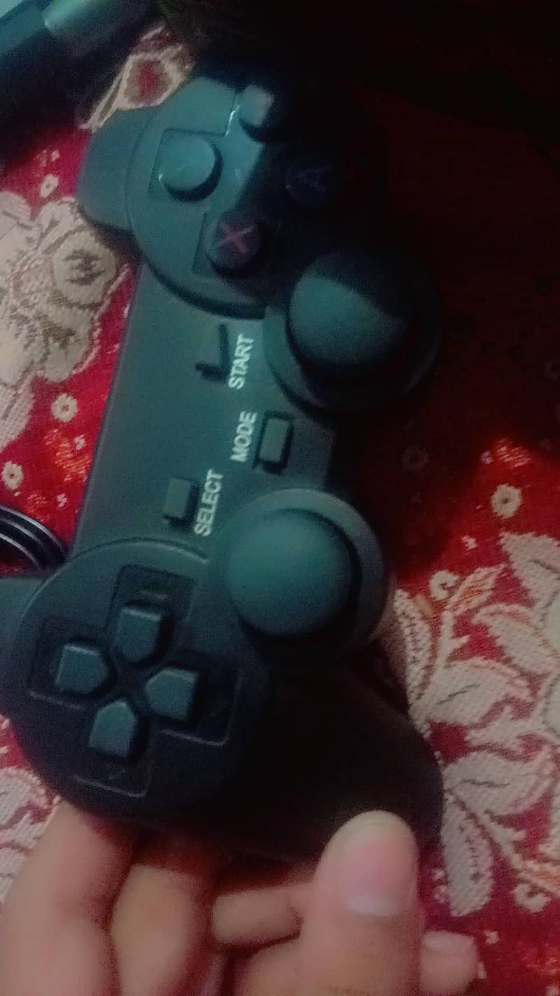 2 wireless Gaming Controllers + Gamestick 2