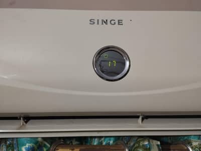SPLIT AC SINGER 1.5 TON PERFECTLY WORKING CHILLED