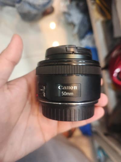 Canon 50mm Stm lens with box good condition