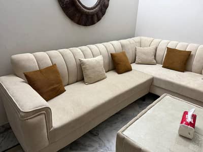 6 seater l shaped sofa with table. . .