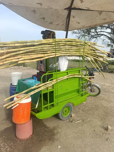 Ganna juice machine with motorcycle rikshaw