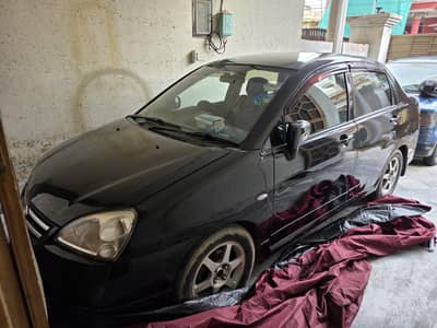 Suzuki Liana RXI 2006 model Black color , Manuel Gear very urgent sale
