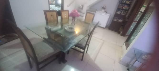 wooden dining table with set of 5 chairs