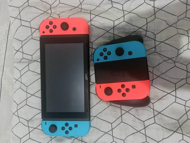 Nintendo Switch v2 + accessories 1