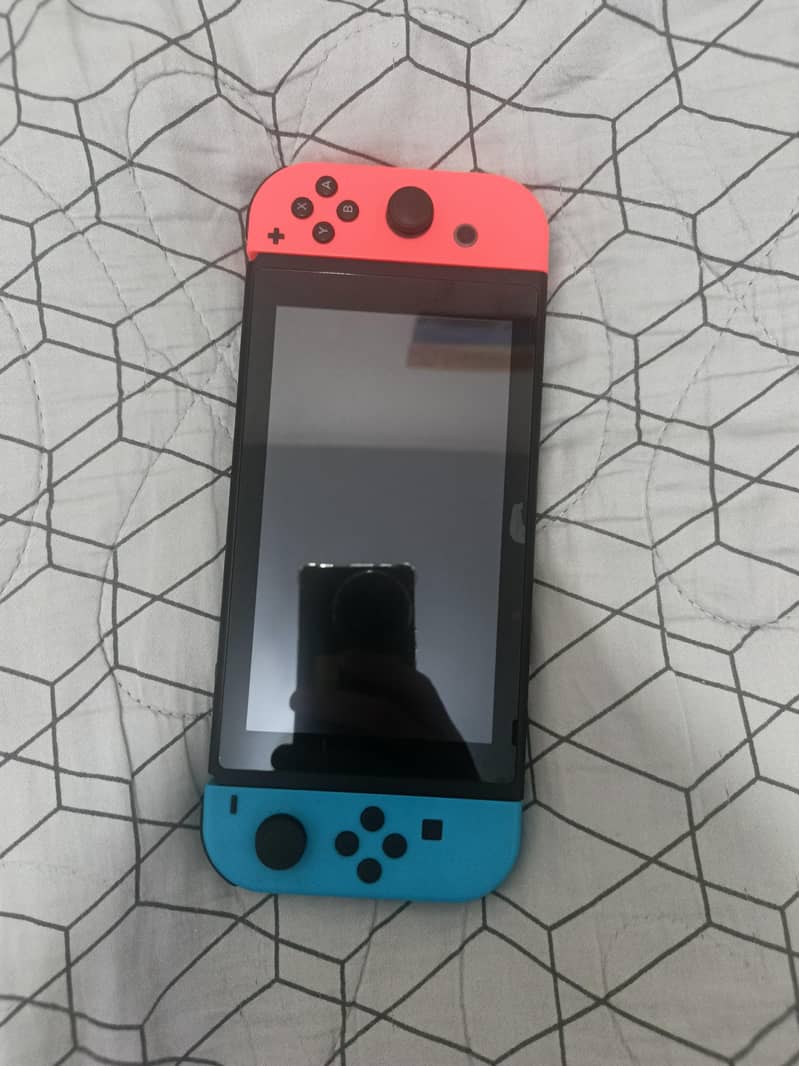 Nintendo Switch v2 + accessories 2