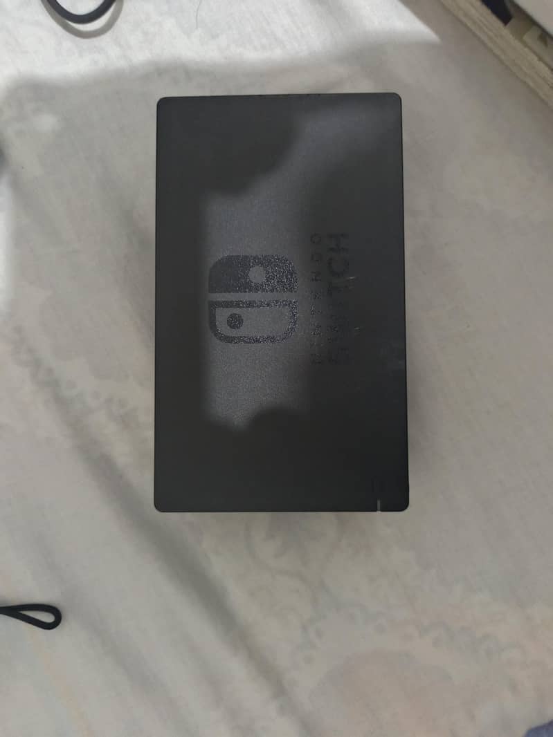 Nintendo Switch v2 + accessories 9