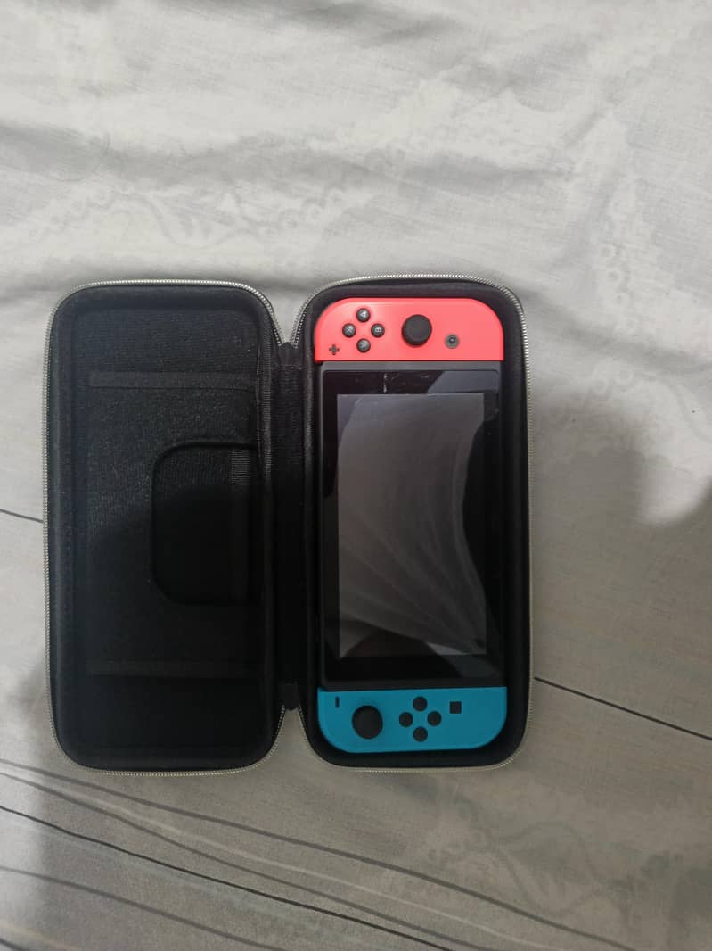 Nintendo Switch v2 + accessories 18