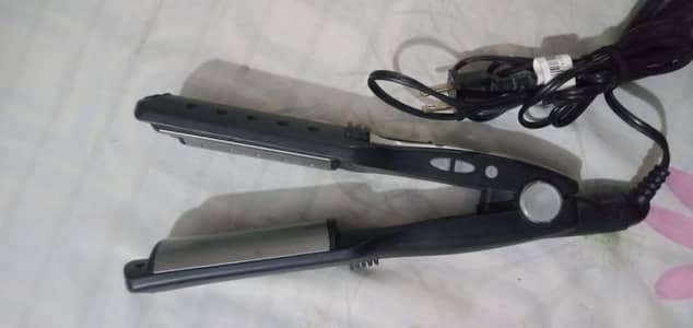 Conair 2 Inch Infiniti straightener.