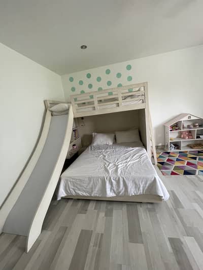 Beautiful designer children’s bunk bed with slide solid wood
