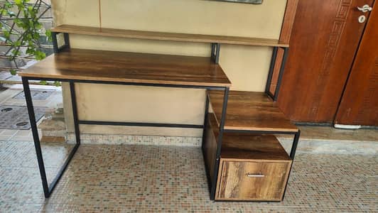 Sparingly used workstation table. Bought new