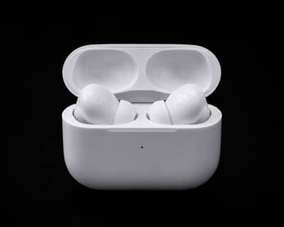 **Premium White Wireless Earbuds with Charging Case**  Experience the