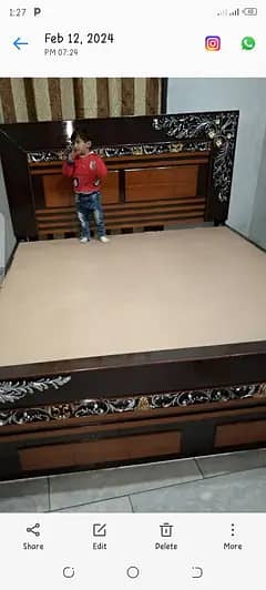 wooden bed in good condition