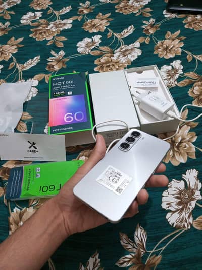 Infinix Hot 60i 12/128 4 month warranty with box charger, accessories