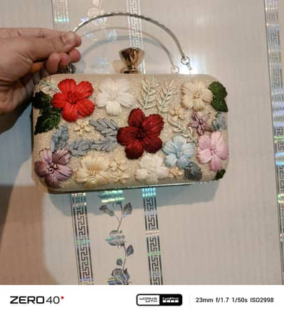Grab this gorgeous hand _embroidered golden party clutch.