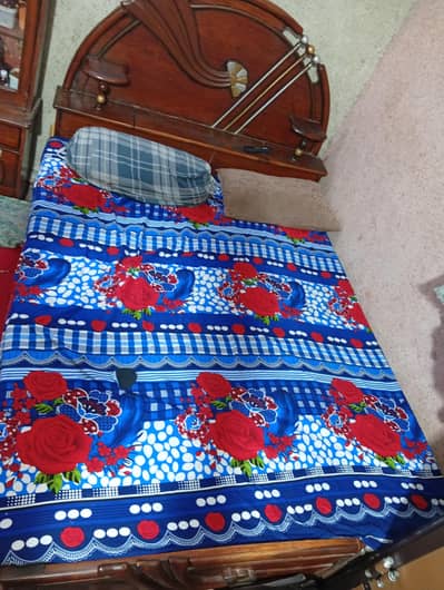 Bed with dressing table