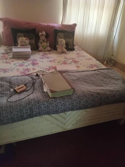 used full wood white  in colour queen size