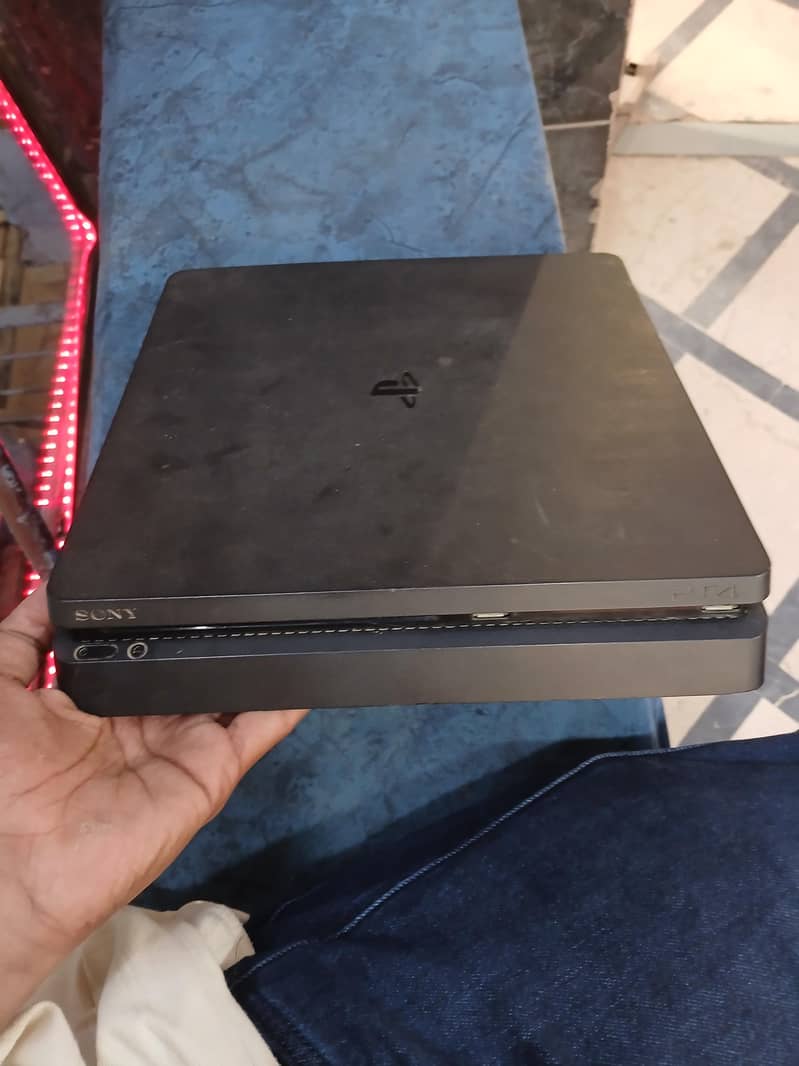 PS4 SLIM + 4 GAMES 1