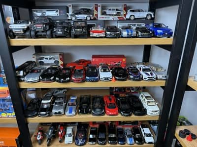 die-cast cars, sports cars, mini cars, and toy trucks at Happy Toys.