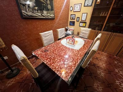 6 wooden cushioned chair with dining table