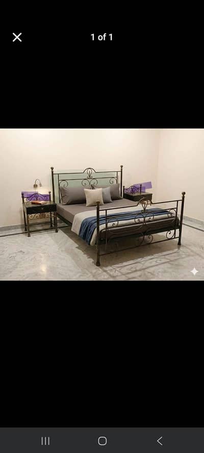 Iron bed with sidetables