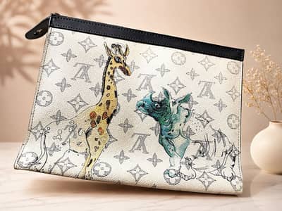 LOUIS VUITTON CHAPMAN POCHETTE VOYAGE GM