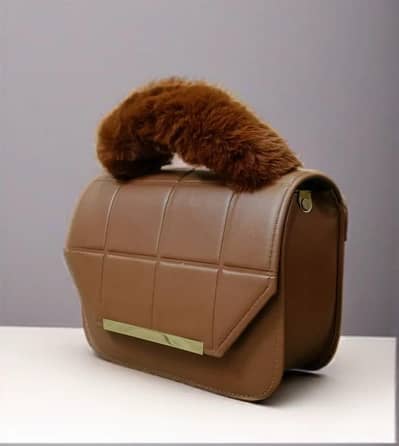 brown quality crossbody bag with flutty handlefor girls