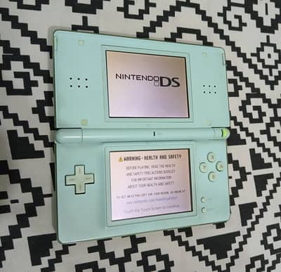 Nintendo DS with Charger and Games