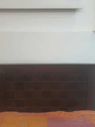single bed in brown colour