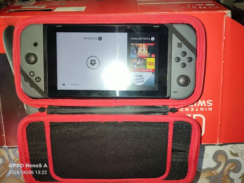 Nintendo switch v2 -9/10 condition+2 boxes+Extra controller-chakwal 1
