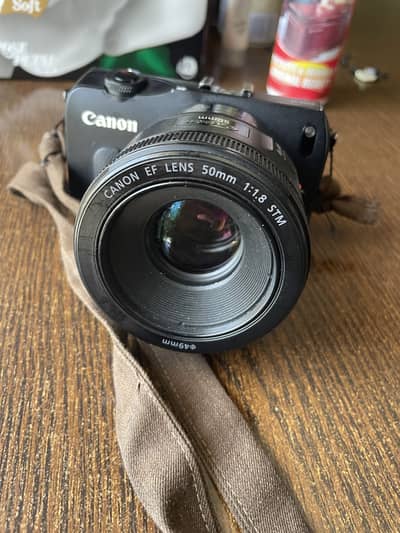 Canon EOS M with 50 MM Lense and Adaptor