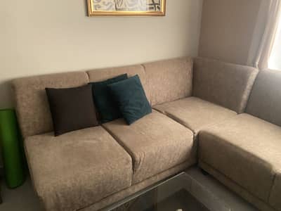 L shaped sofa with center table, best condition