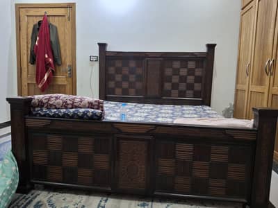King size bed with side tables and mattress