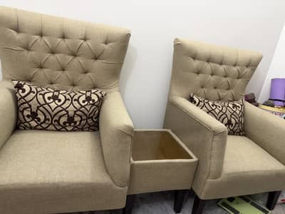 2 single sofas and coffee table